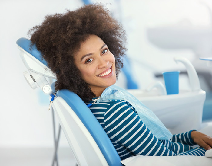 young woman in dental chair